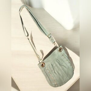 LaTique Ladies Crossbody Purse color green.